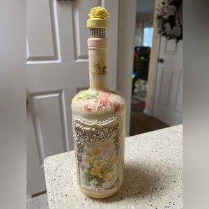 Decorated glass bottle
